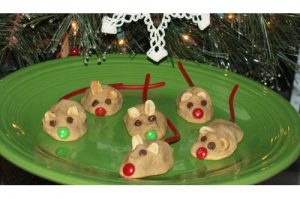 Mice cookies on green plate