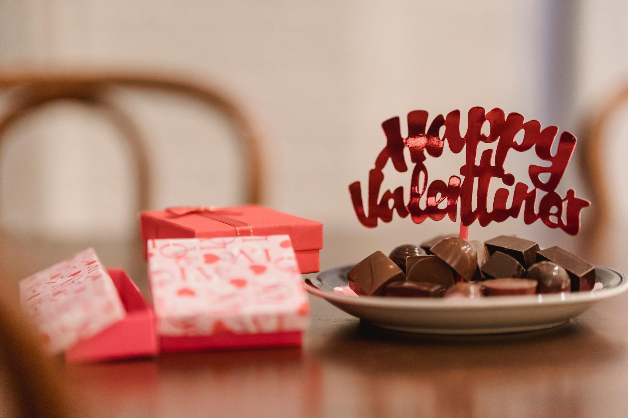 Chocolates on a plate with a Happy Valentine's Day sign